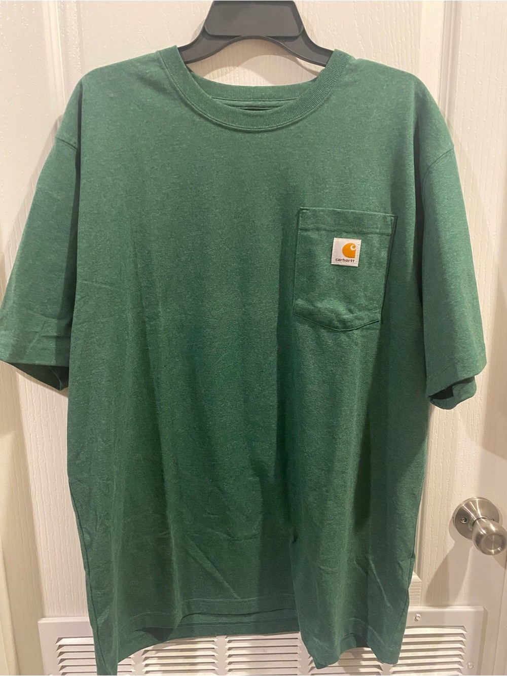 Carhartt Crew Pocket Tee in Heather Green with Orange Logo